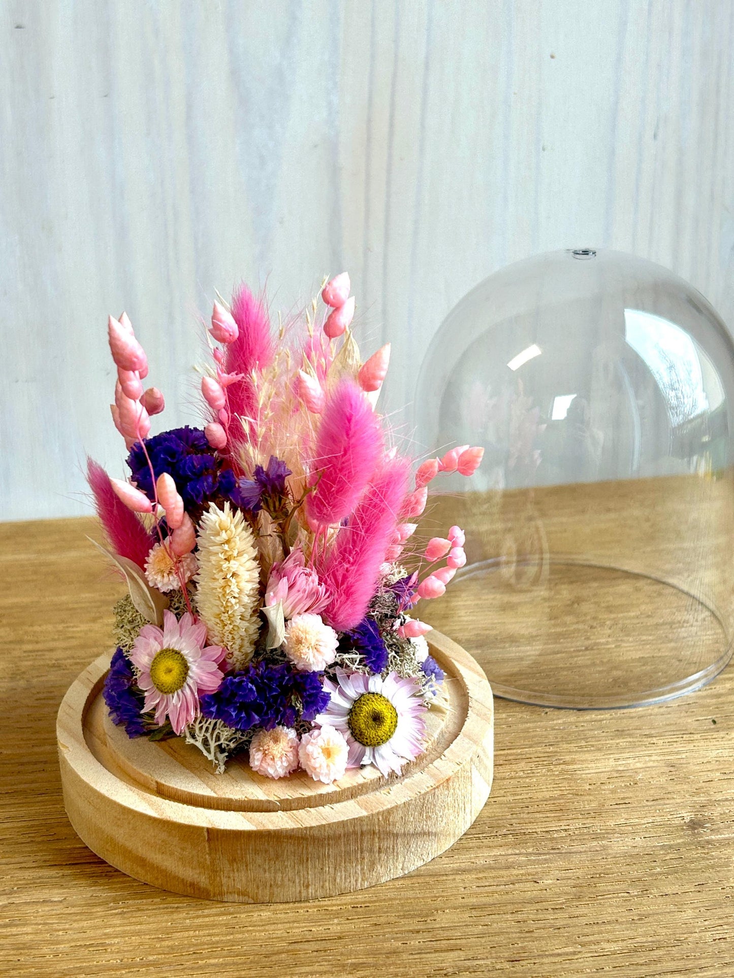 Cloche de fleurs séchées “Flamant rose”