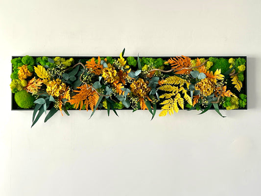 Tableau végétal stabilisé avec fougères, cadre végétal stabilisé orange et jaune, décorations couleurs jaune moutarde eu orange
