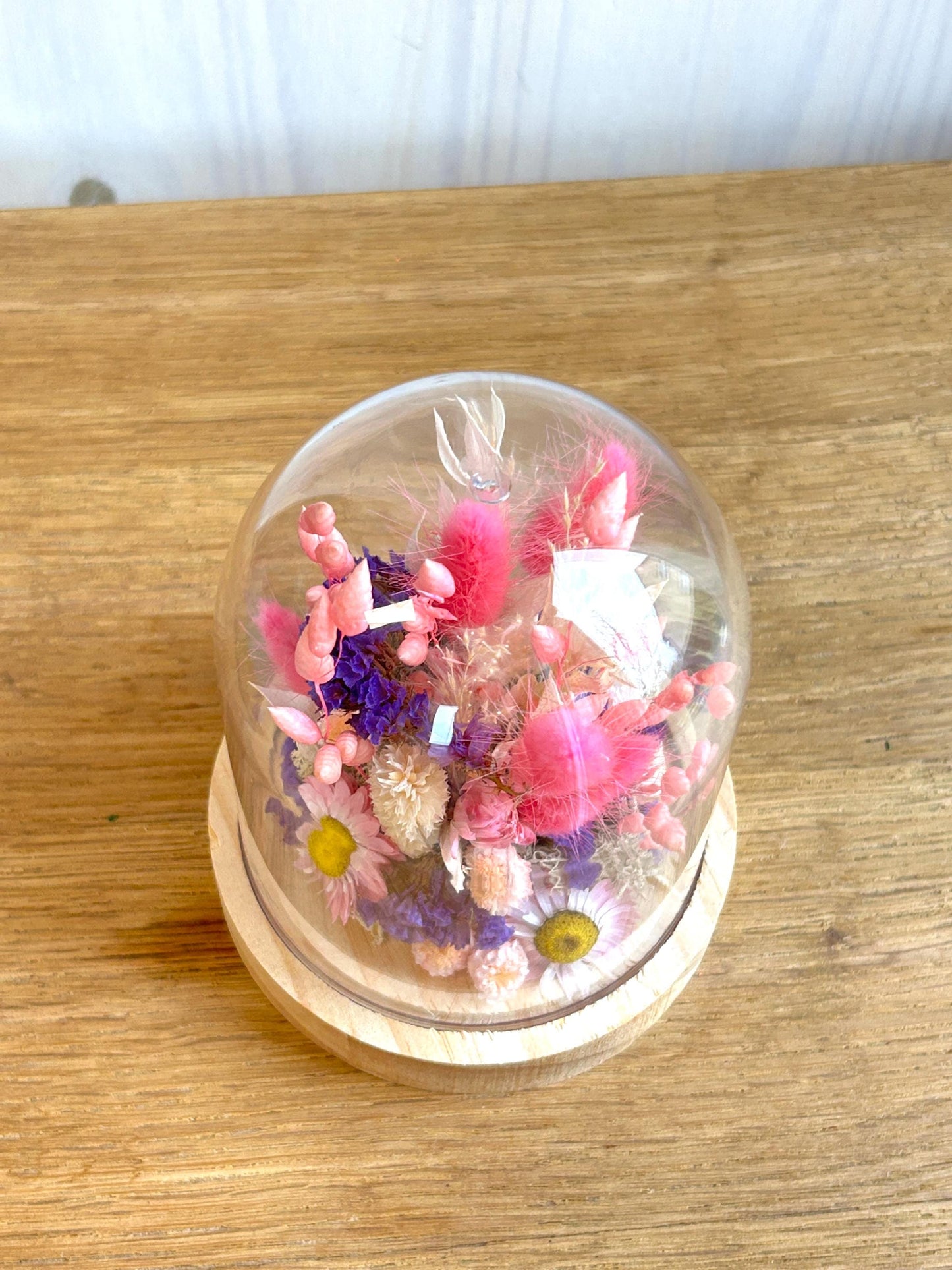 Cloche de fleurs séchées “Flamant rose”